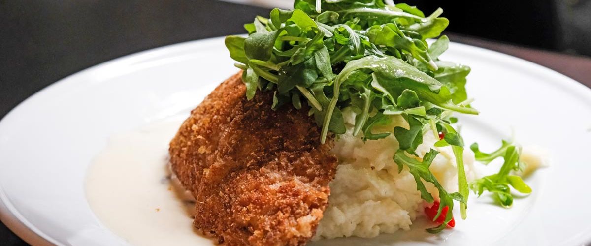 panko crusted fish with arugula and creamy risotto